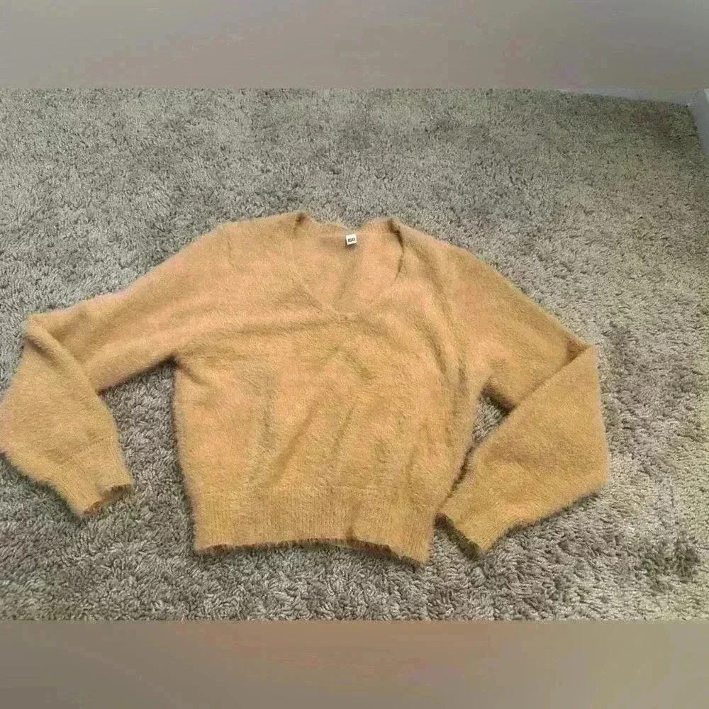Kids sweater size 12.